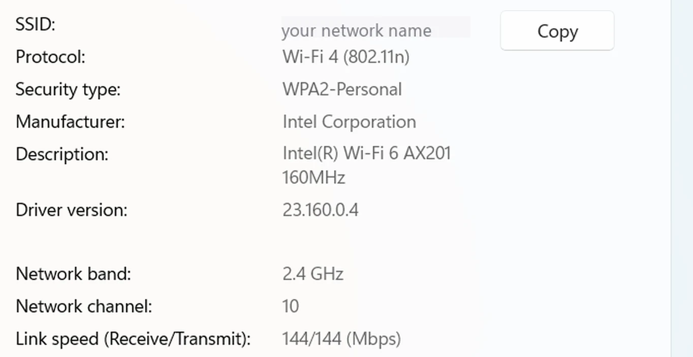 Windows 11 Wi-Fi properties showing network band 2.4 GHz, network channel 10 and a 144 Mbps link speed